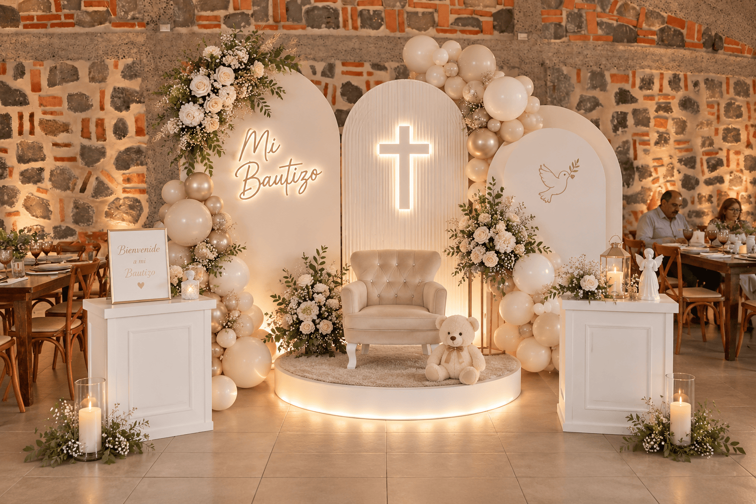 Ambientación elegante para bautizo con silla para la ceremonia, globos, flores y cruz iluminada